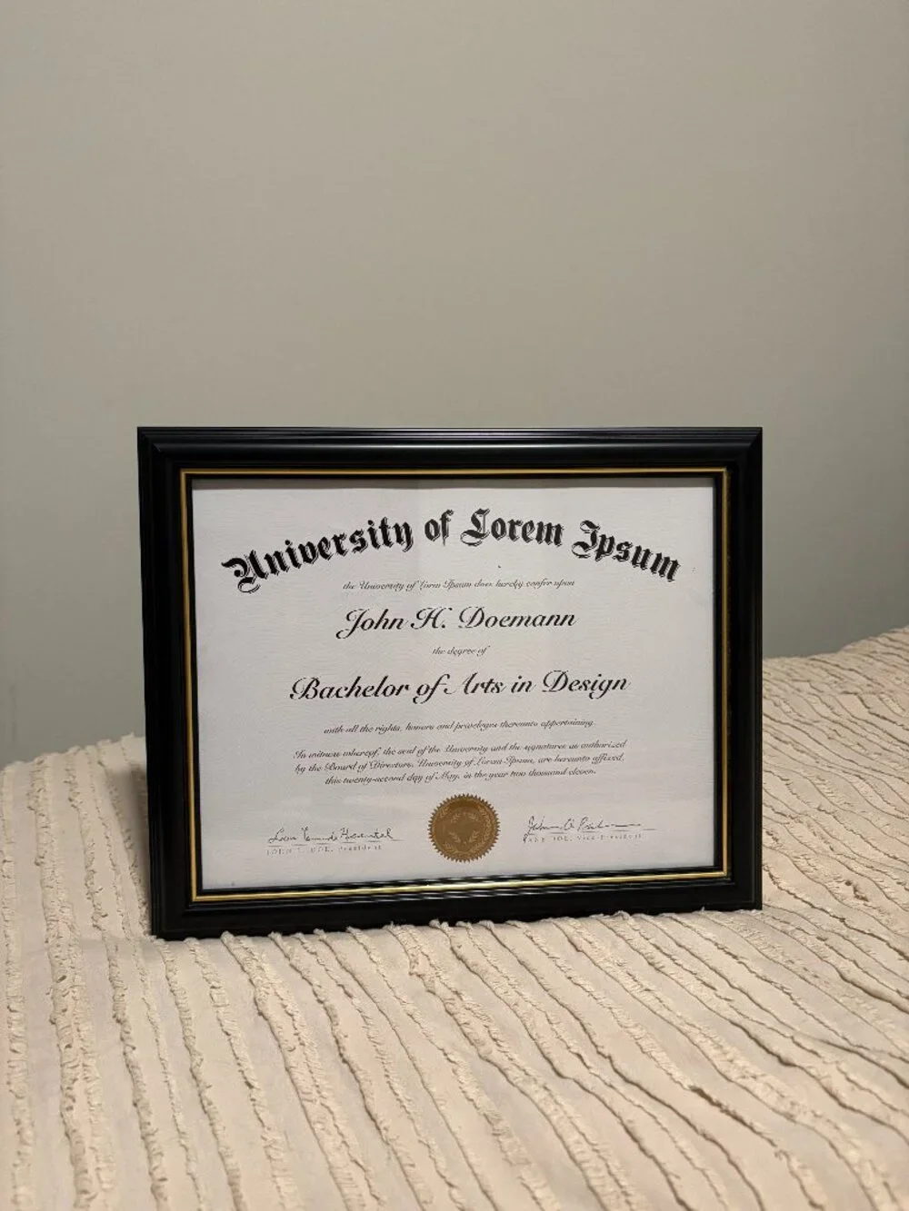 Black and gold diploma frame